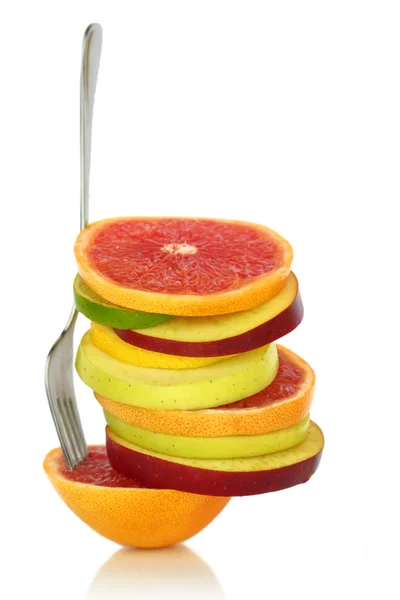 Fresh mixed slices of fruit in a row — Stock Photo, Image