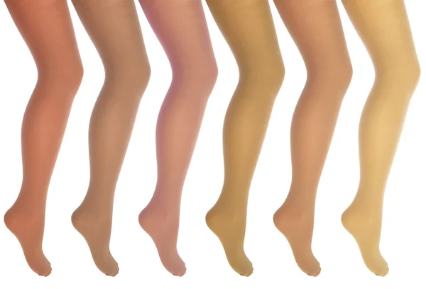 Pernas femininas em vários collants — Fotografia de Stock