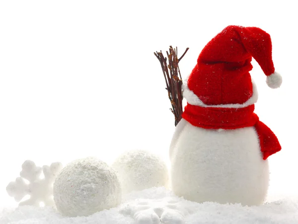 Visão traseira de boneco de neve e enfeites de Natal na neve — Fotografia de Stock