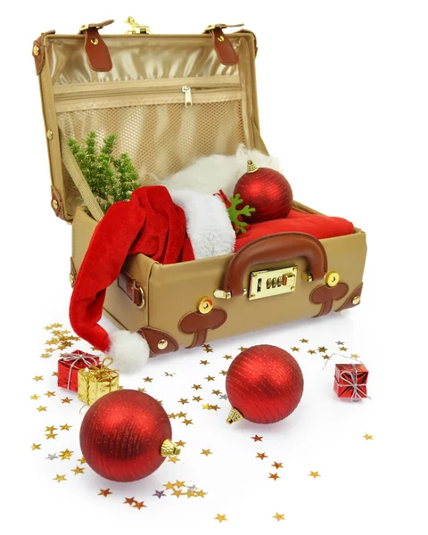 Travel suitcase with Christmas ornaments isolated on white — Stock Photo, Image