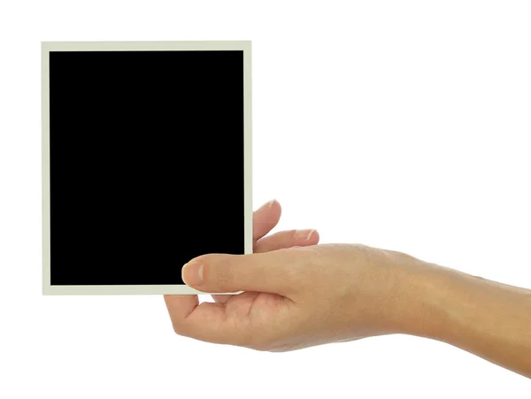 Hand holding blank photo frame isolated on white background — Stock Photo, Image