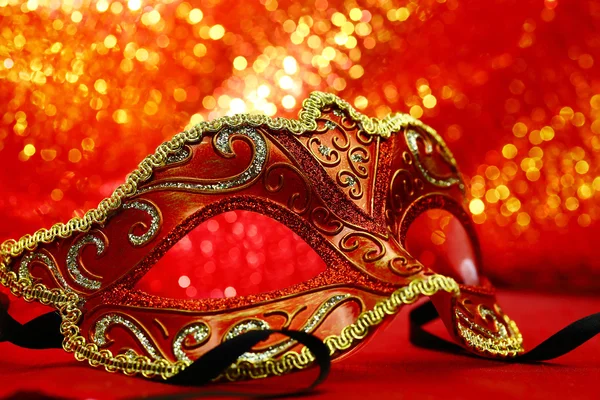 Vintage carnival mask in front of glowing background — Stock Photo, Image