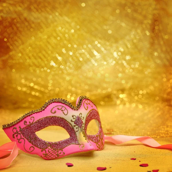 Vintage carnival mask in golden background — Stock Photo, Image