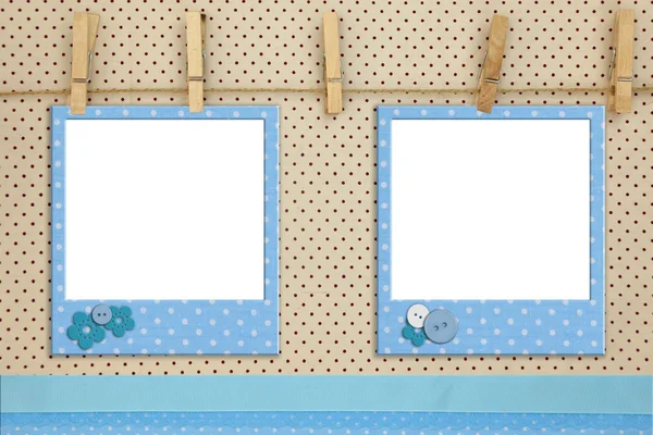 Blue photo frames hanging on a rope — Stock Photo, Image