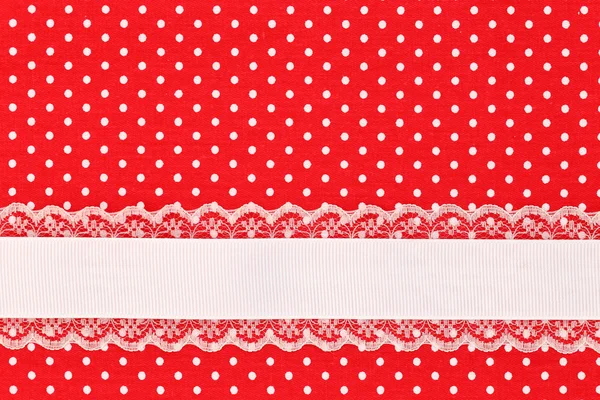 Red retro polka dot textile background with ribbon — Stock Photo, Image
