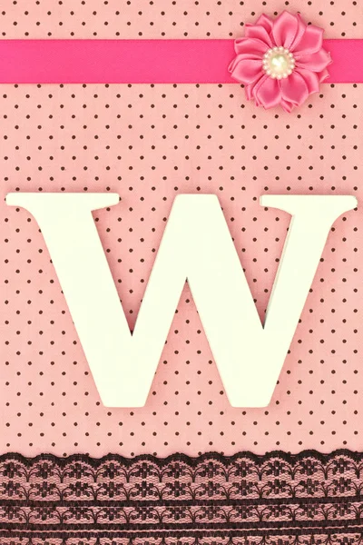 Wooden letter W on polka dots background — Stock Photo, Image