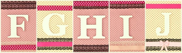 Houten letters F G H I J op polka dots achtergrond — Stockfoto