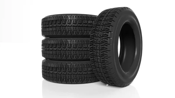 Stack of four black tires isolated on white background — Stock Photo, Image