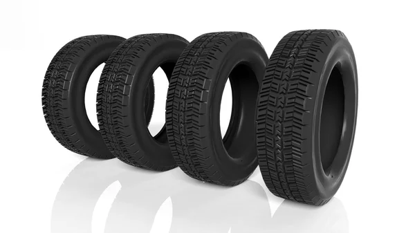 Group of black tires isolated on white background — Stock Photo, Image