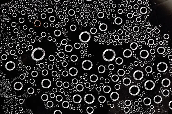 Bolhas de água abstratas fundo preto — Fotografia de Stock