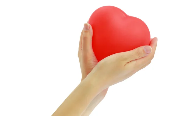 Red heart balloon in womans hands — Stock Photo, Image
