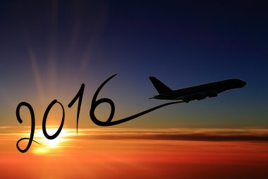 Yeni yıl 2016-uçakla yayında günbatımında çizim 