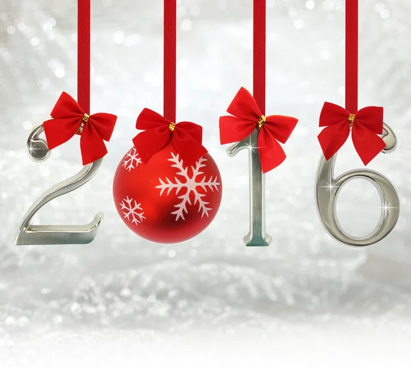 2016 number ornaments hanging on red ribbons in a glittery background — Stock Photo, Image