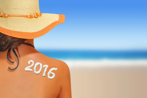 2016 written on woman's back — Stock Photo, Image