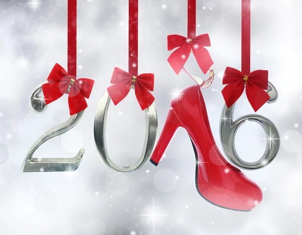 High heel shoe and 2016 number hanging on red ribbons in a glittery background — Stock Photo, Image