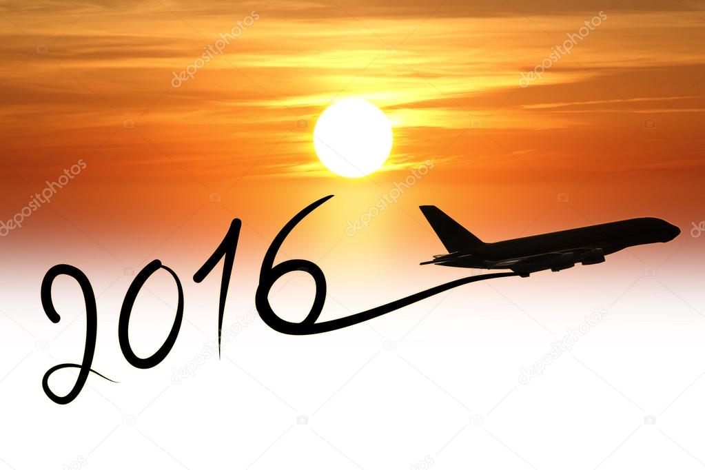 New year 2016 drawing by airplane on the air at sunset 