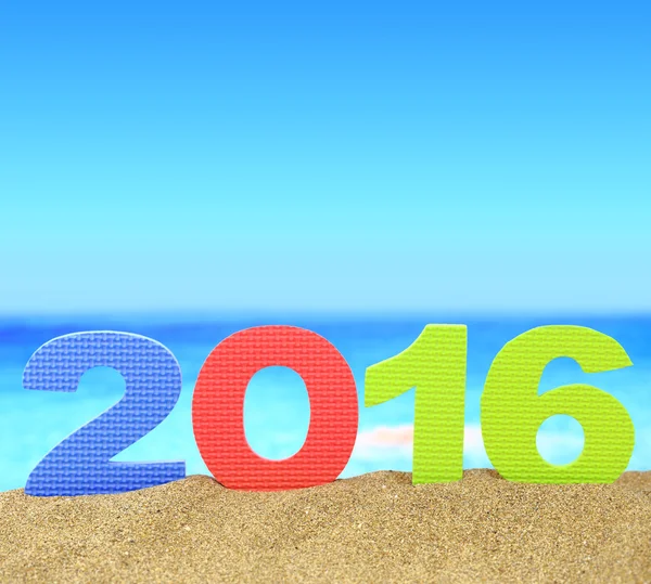 New year number 2016 on the beach — Stock Photo, Image