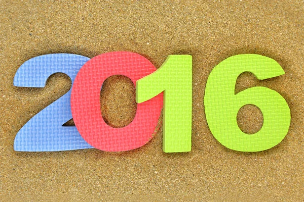 New year number 2016 on the beach — Stock Photo, Image