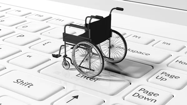 Cadeira de rodas no teclado de laptops preto, conceitual — Fotografia de Stock