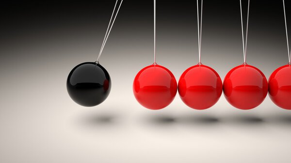 Newton's cradle closeup abstract background