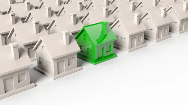 Hus modeller rader med en grön står ut med kopia-utrymme — Stockfoto