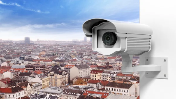 Security surveillance camera over the city — Stock Photo, Image