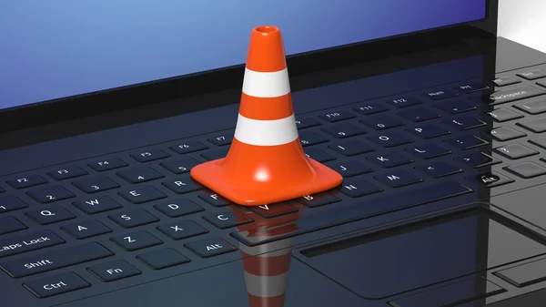 Orangefarbener Verkehrskegel auf schwarzer Laptop-Tastatur — Stockfoto