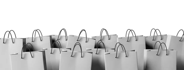 Cinza sacos de compras em branco isolado no fundo branco — Fotografia de Stock