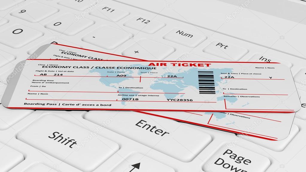 Two air tickets on white laptop keyboard 