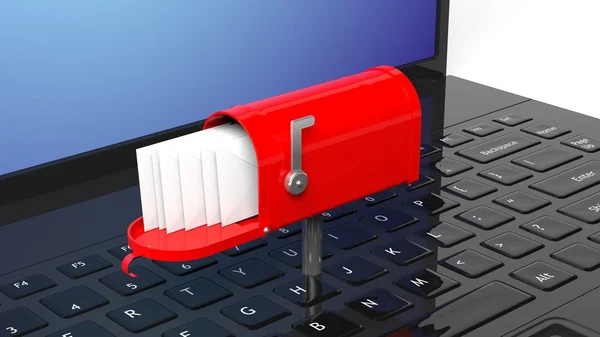 Cassetta postale rossa con buste sulla tastiera nera del computer portatile — Foto Stock
