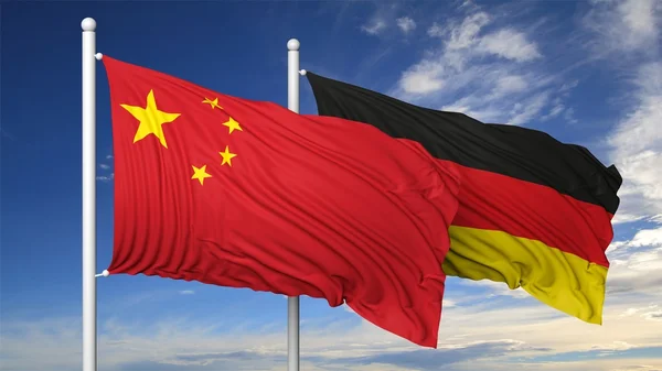 Waving flags of China and Germany on flagpole, on blue sky background. — Stock Photo, Image