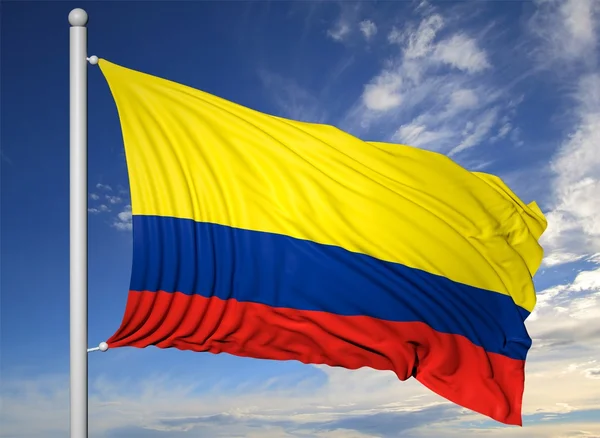 Bandera de Colombia ondeando sobre asta de bandera, sobre fondo azul del cielo . —  Fotos de Stock