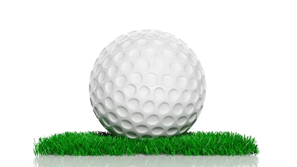 Golf ball on green turf patch, isolated on white background — Stock Photo, Image