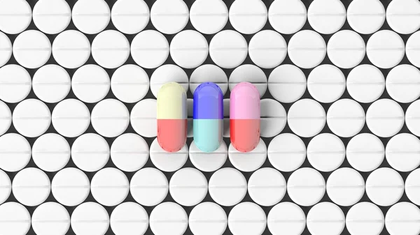 Colorful caplets on top of white round pills background. — Stock Photo, Image