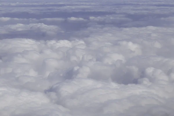 Aerial photography with white fluffy clouds — Stock Photo, Image