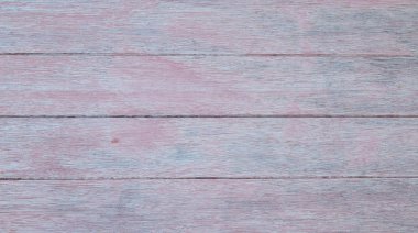 Wooden wall with red and blue tints