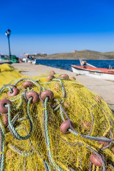Photo of tangled fishing net against of beautiful seascape — Stock Fotó
