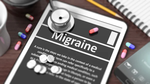 Tablet with "Migraine" on screen, stethoscope, pills and objects on wooden desktop. — Stock Photo, Image