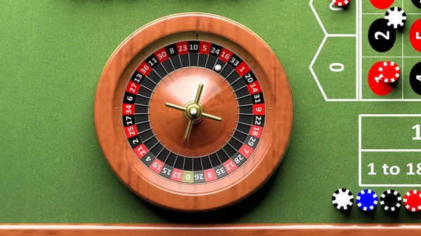 Roulette-Rad auf grünem Tisch, Pokerchips von oben — Stockfoto