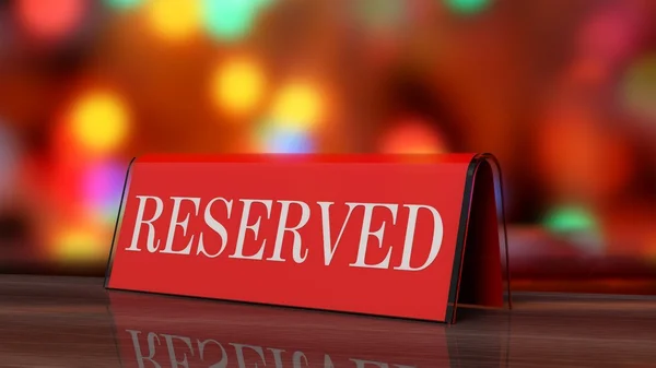 Red glossy reservation sign on wooden surface, with festive background. — Stock Photo, Image