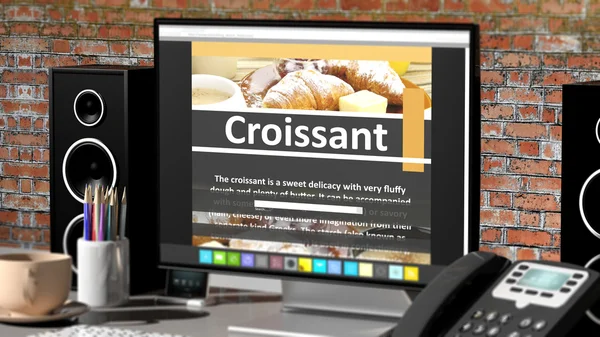 Monitor con ricetta Croissant sul desktop con oggetti per ufficio . — Foto Stock