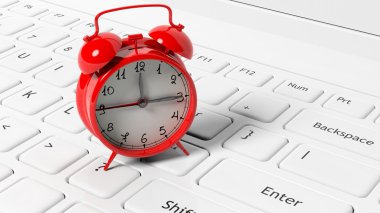 Kırmızı alarm clock beyaz dizüstü klavye.