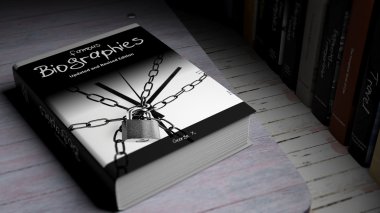 Hardcover book on Famous Biographies with illustration on cover, on wooden surface.