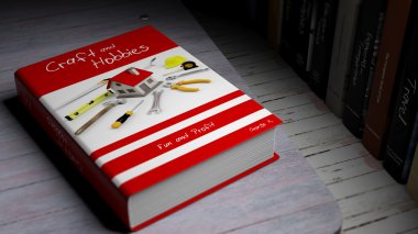 Hardcover book on Craft and Hobbies with illustration on cover, on wooden surface.