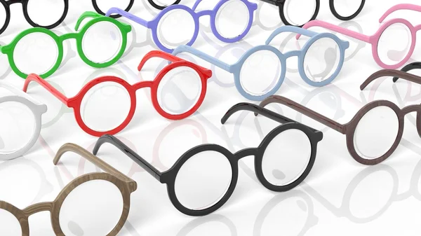 Diverse kleur ronde-lens brillen, geïsoleerd op witte achtergrond. — Stockfoto