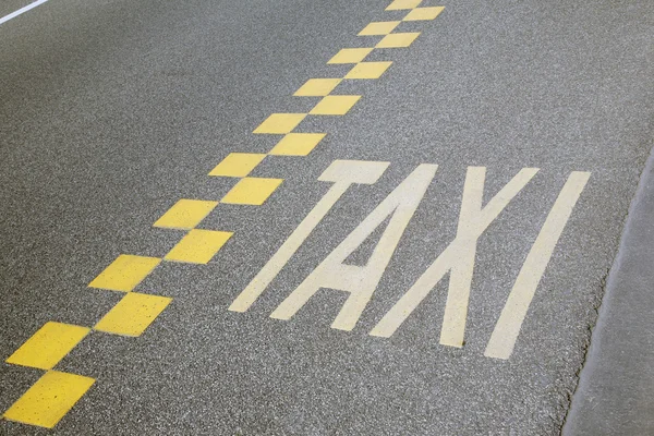 Taxi jaune signe à Bruxelles — Photo