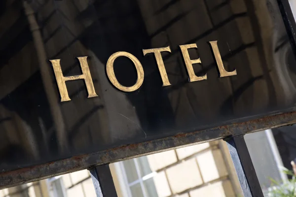 Goldenes Hotelschild — Stockfoto