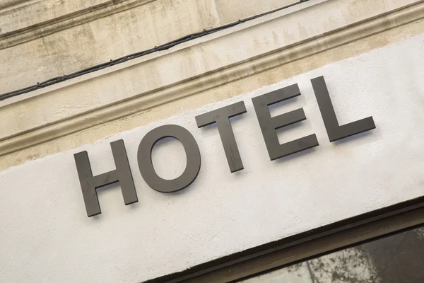 Hotel Sign on Wall — Stock Photo, Image