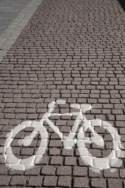 Symbole de vélo sur pierre pavée — Photo
