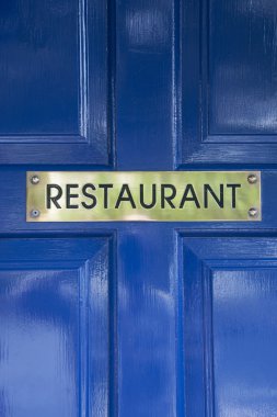 Restoran işareti mavi kapı